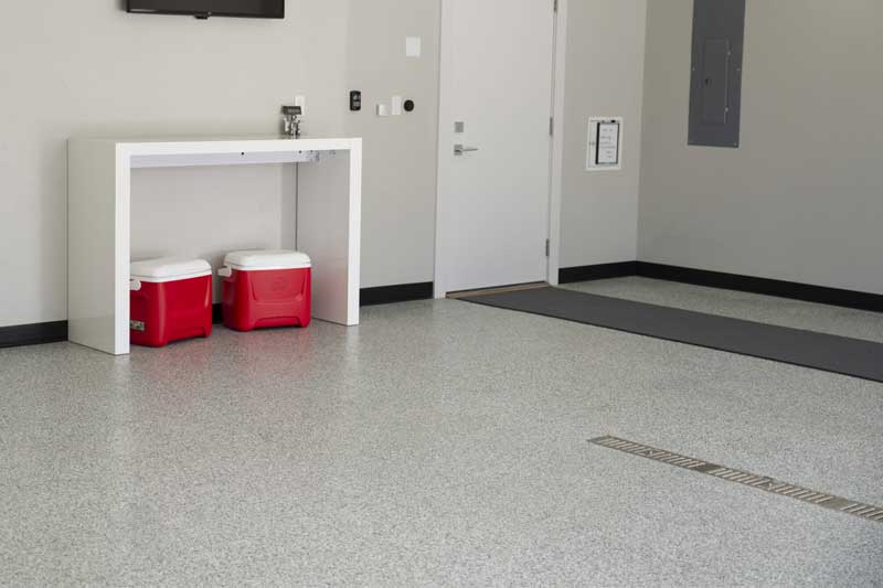 Garage flooring by Castle Stone Concrete in Winnipeg