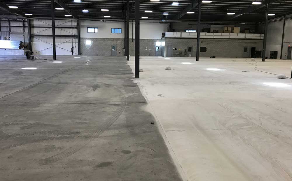 Warehouse floor in Winnipeg, grinding half completed.